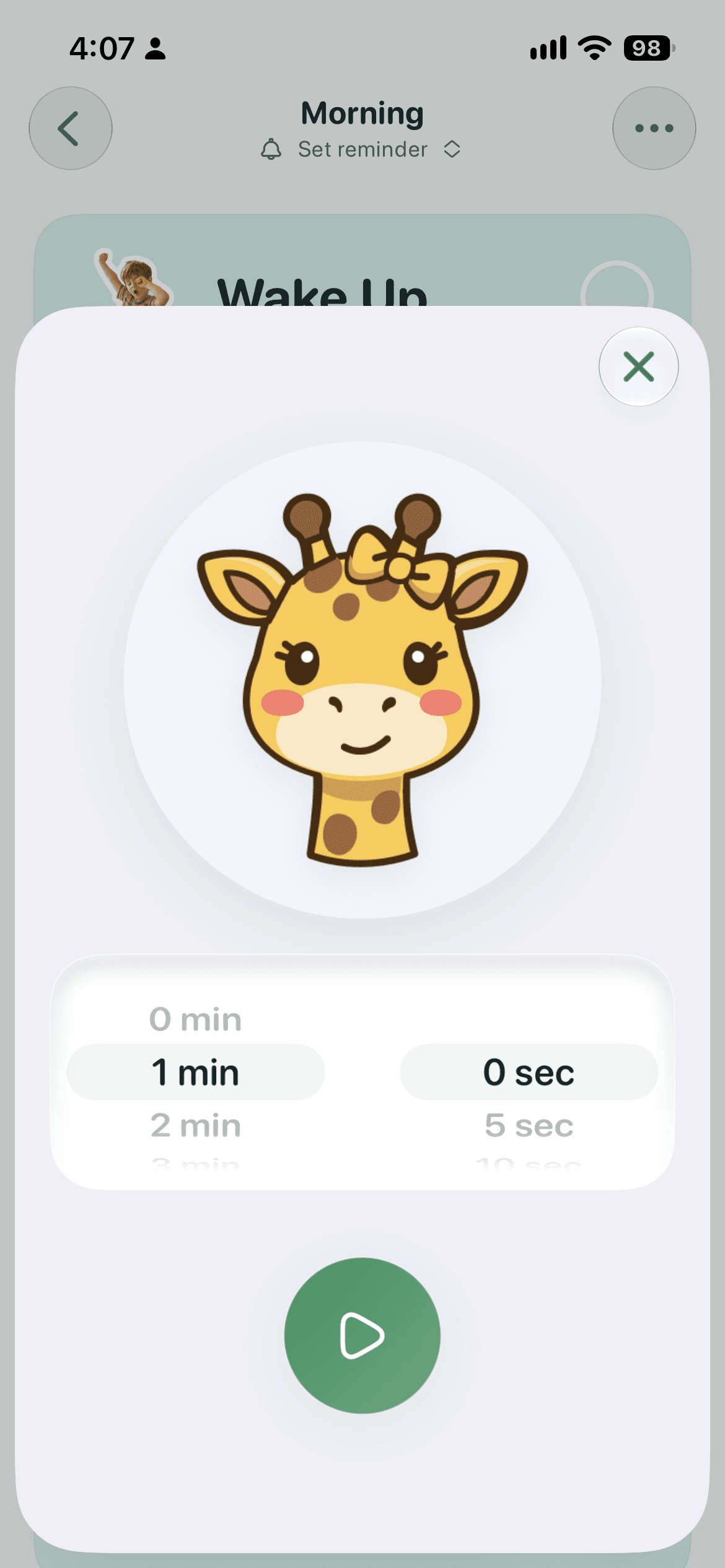 KidCue timer setup with a giraffe illustration, one-minute selection, and play button